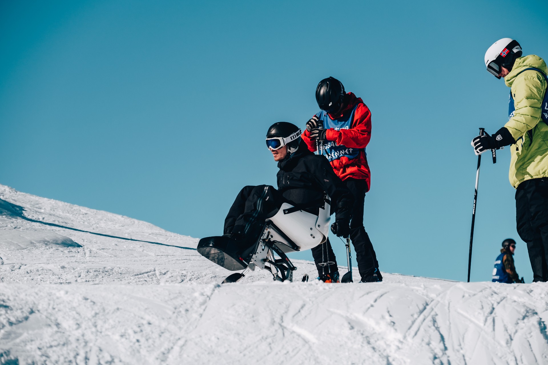 A participant together with a guide on the alpine slope