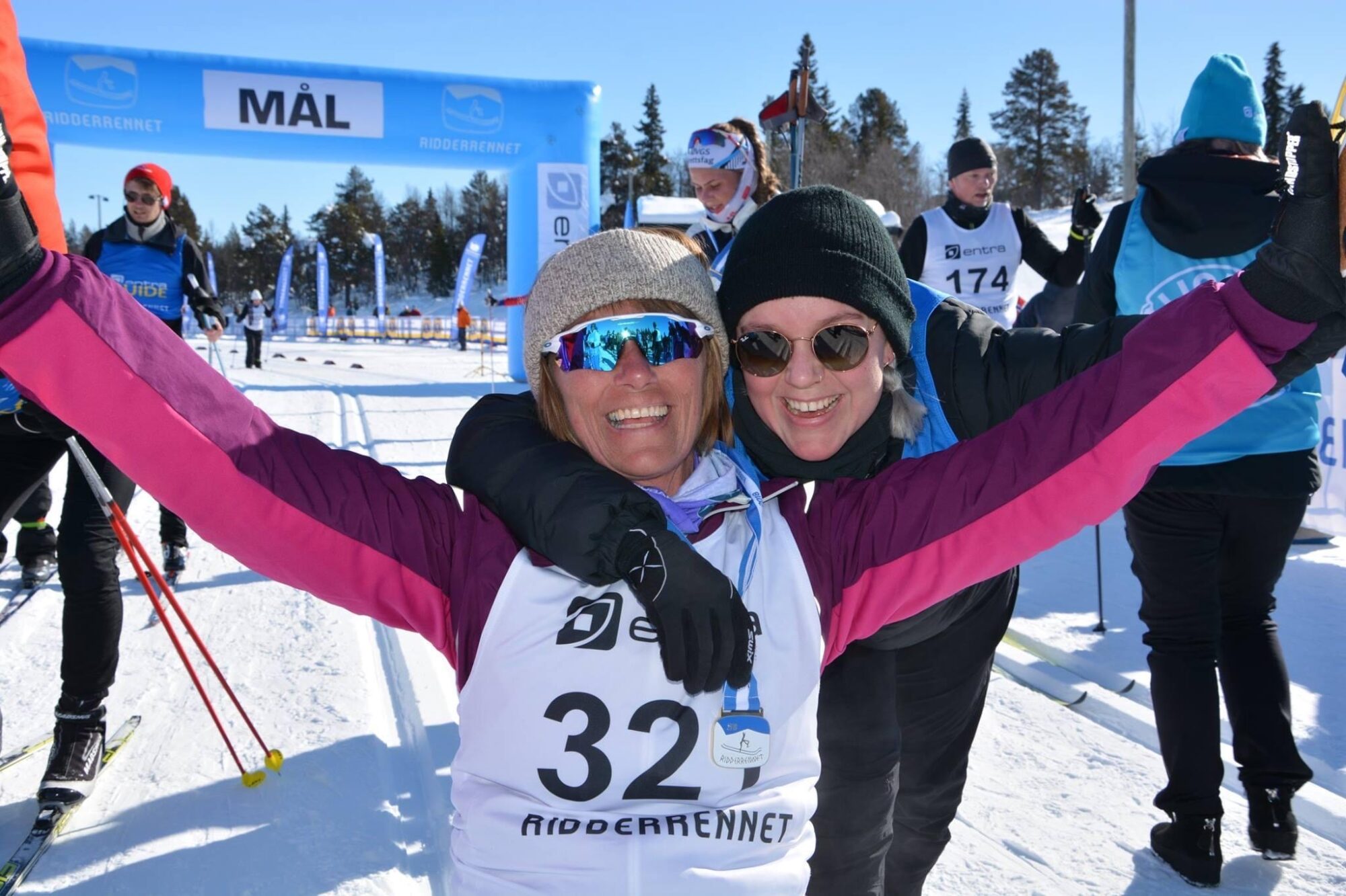 Happy and jubilant guide and participant after completing Ridderrennet